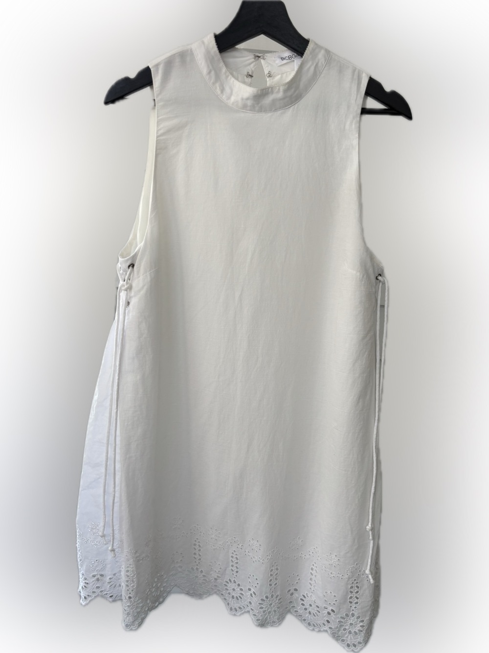 BCBGeneration White Sleeveless Eyelet Hem Tunic with Side Ties